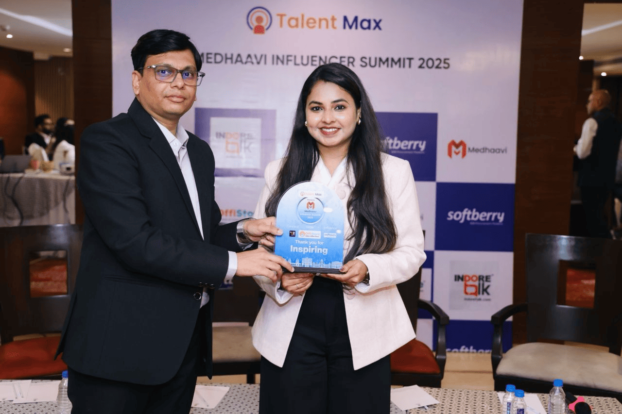 Ishan Mishra presenting an award